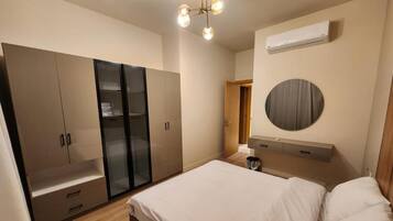 Comfort Apartment, Private Bathroom, City View | Laptop workspace, iron/ironing board, free WiFi