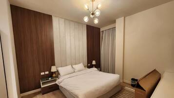 Comfort Apartment, Private Bathroom, City View | Laptop workspace, iron/ironing board, free WiFi
