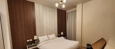 Comfort Apartment, Private Bathroom, City View | Laptop workspace, iron/ironing board, free WiFi