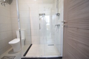 Shower, towels, soap, toilet paper - A cosy and well presented 2 bedroom apartment (JXR2+94H, Sakumono)