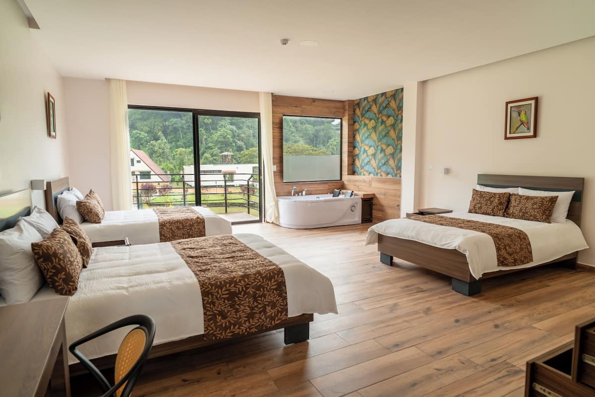 Chambre triple, baignoire Ă jets