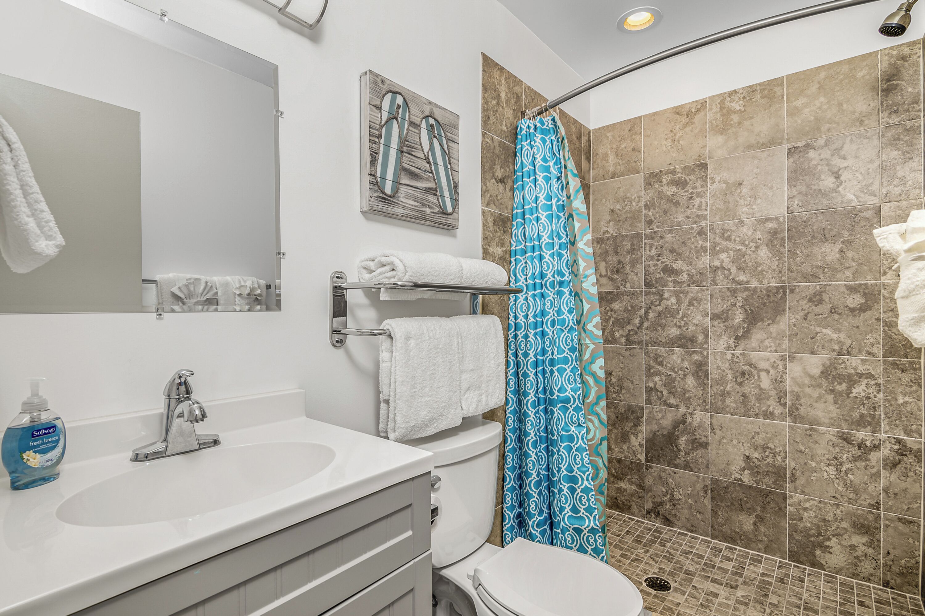 Hair dryer, towels, soap, toilet paper