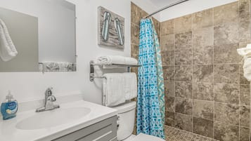 Hair dryer, towels, soap, toilet paper