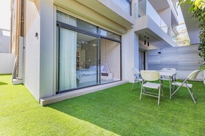 Outdoor dining - ALSAWAH 2BR Garden - Lake View Residence (New Cairo)