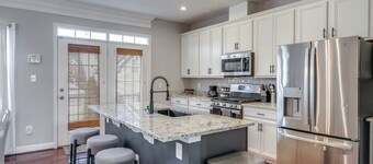 Centrally located Spacious 4-bedroom townhome in tranquil Laurel with AC.