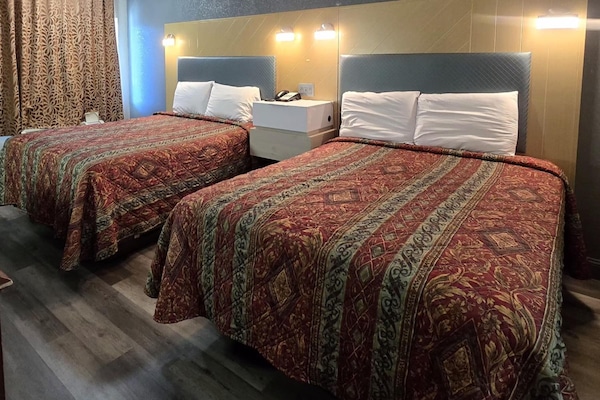 Stretch out and relax with extra space between two beds.