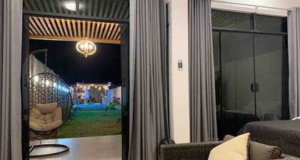 Casa en Ica con amplias áreas verdes, piscina, bbq
