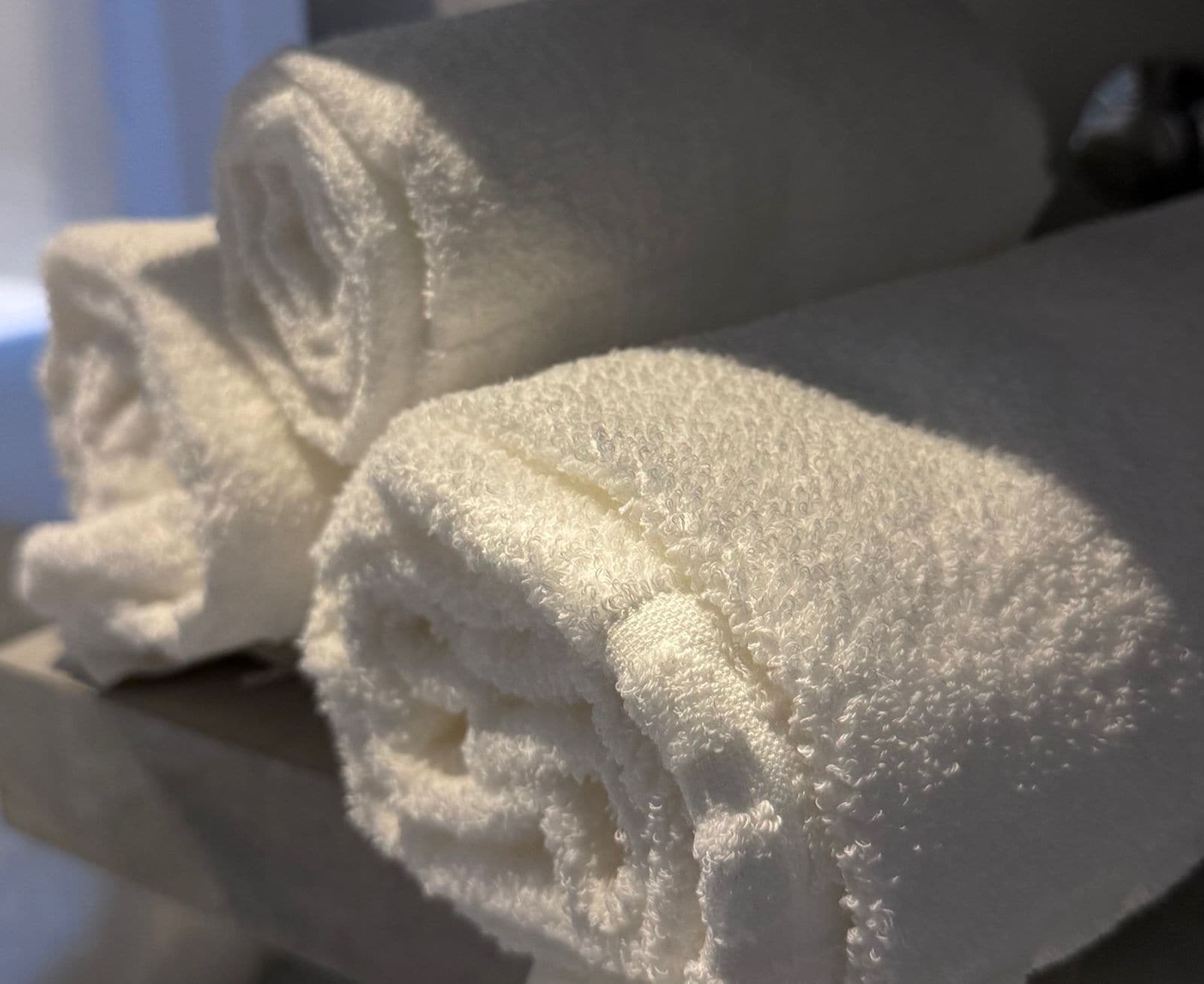 Shower, towels, soap, shampoo
