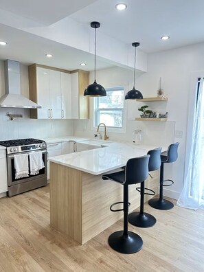 Fridge, microwave, dishwasher, coffee/tea maker