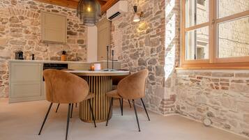 Deluxe Duplex, City View | Living area