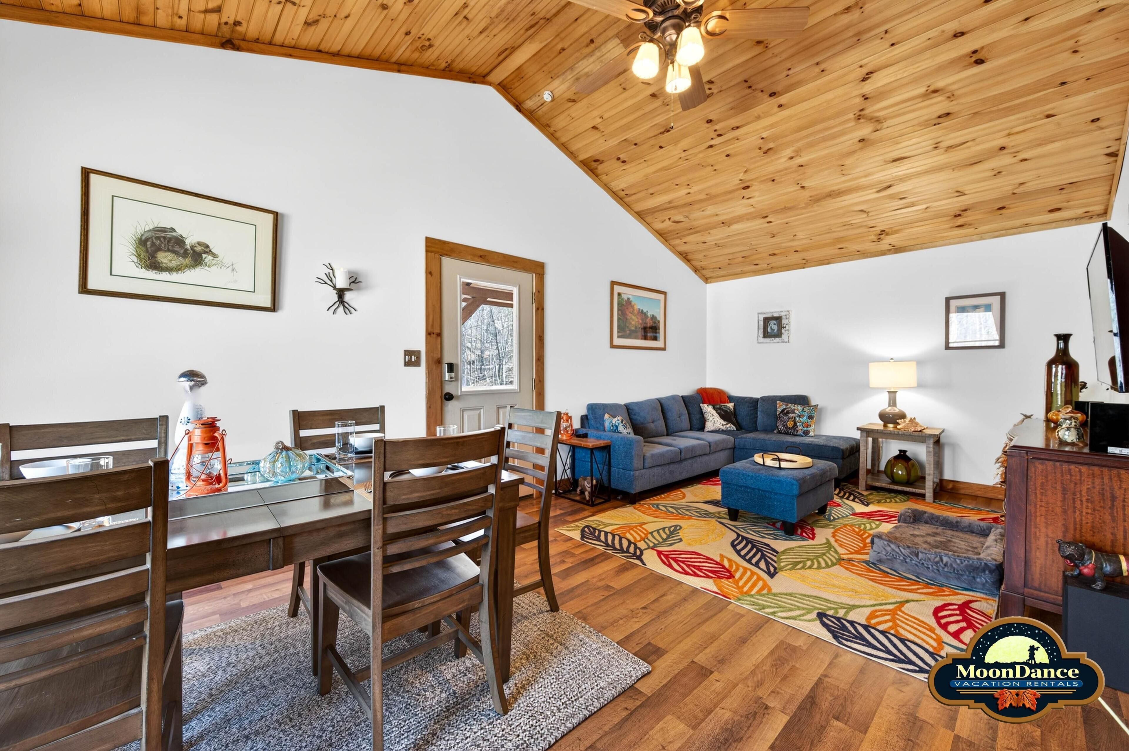 Cozy living and dining area with rustic wood accents