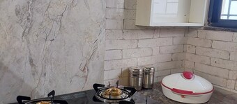 Cozy 1-bedroom apartment in soothing Nagpur with AC,The Pinnacle Retreat Jaitala