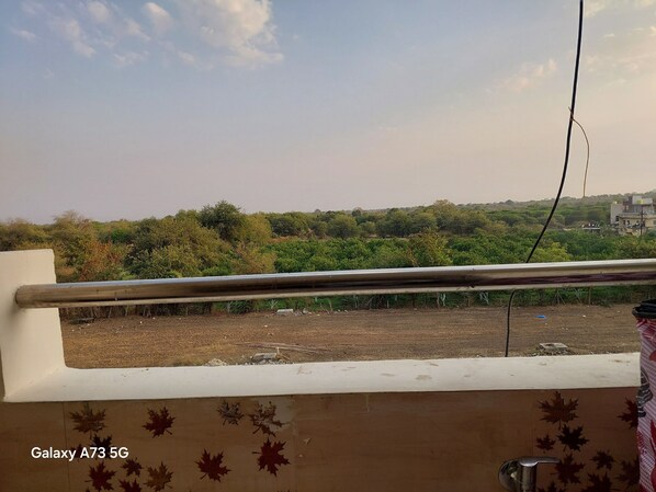 Property grounds - Cozy 1-bedroom apartment in soothing Nagpur with AC,The Pinnacle Retreat Jaitala (Nagpur)