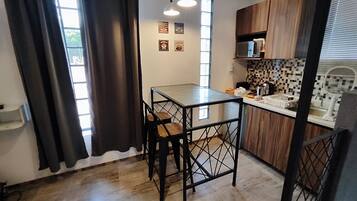 Departamento Confort, vista a la ciudad | Restaurantes