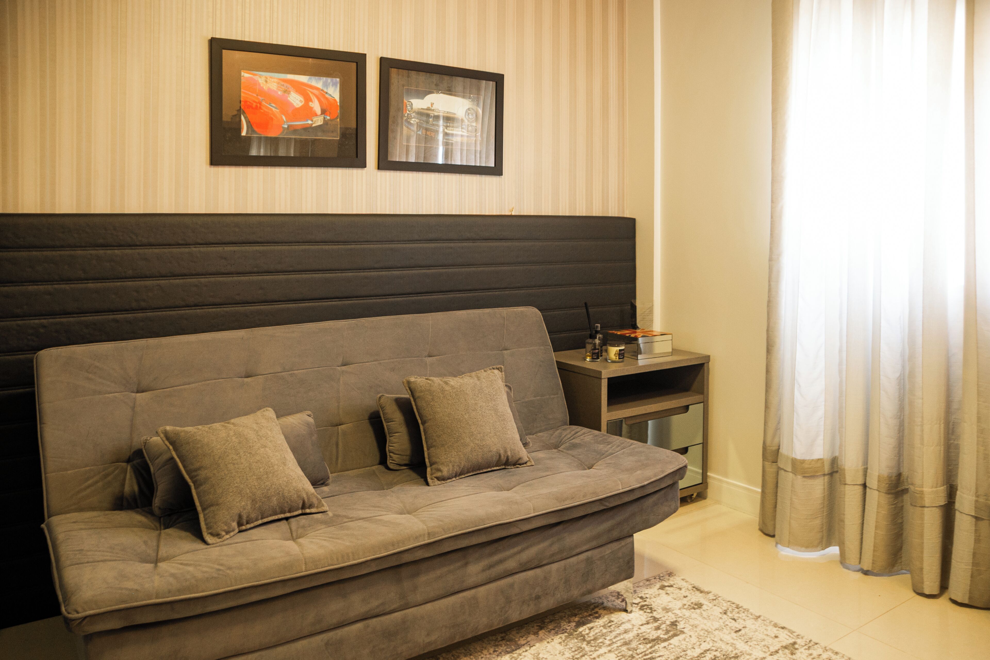 Departamento, balcón, vista a la playa | Área de sala de estar