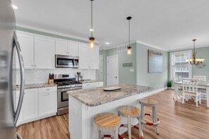 Fridge, microwave, oven, stovetop - 10th Street Beach Block Condo (Ocean City)