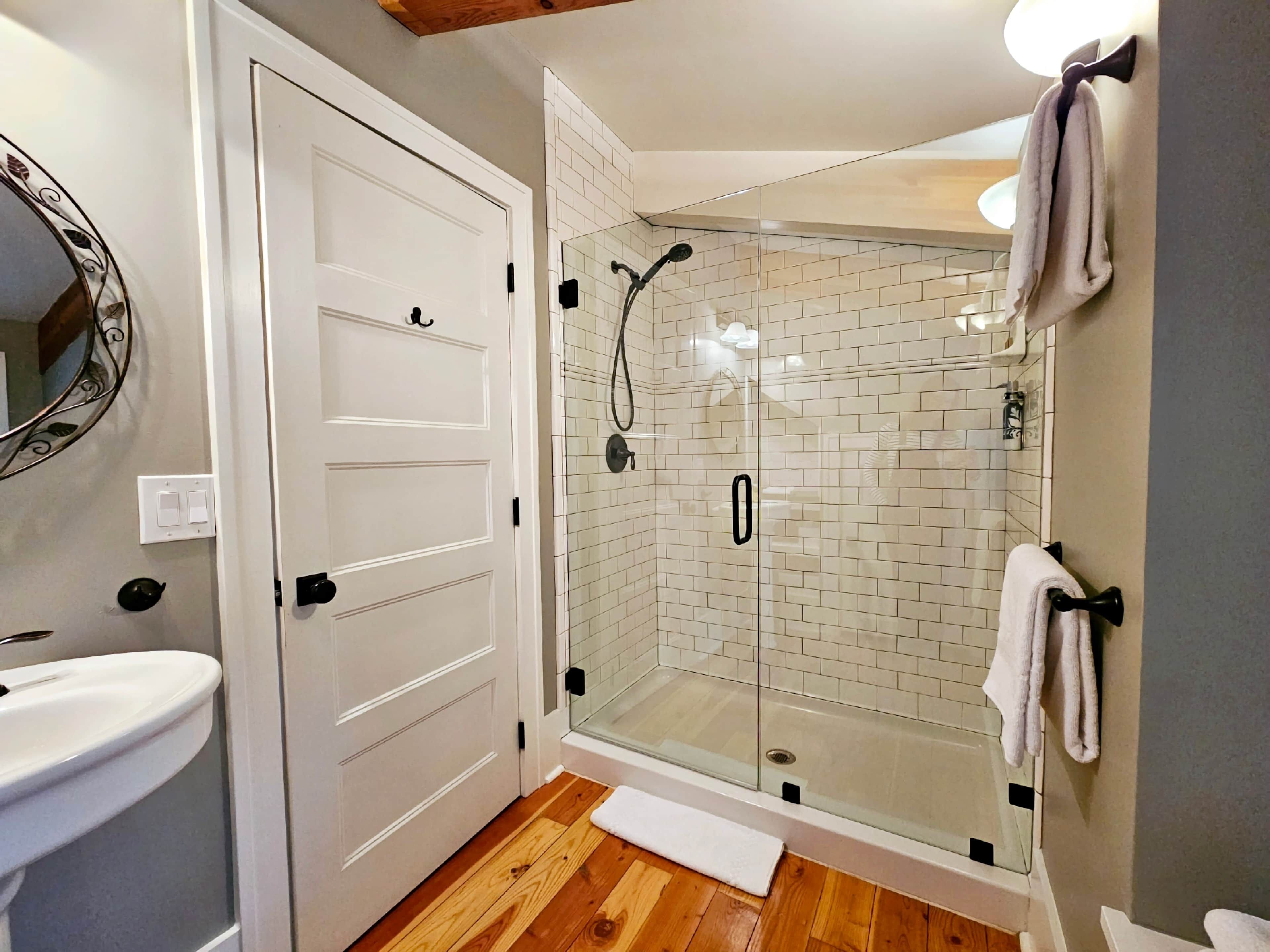Shower, hair dryer, towels, soap