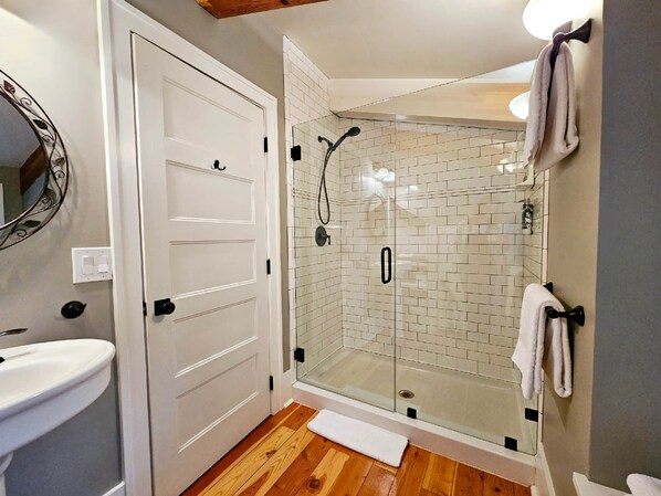 Shower, hair dryer, towels, soap