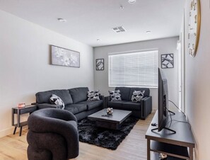 Living area - Brand New Luxury 2BR/BA w/Pool + Grill Modern Stay (Phoenix)