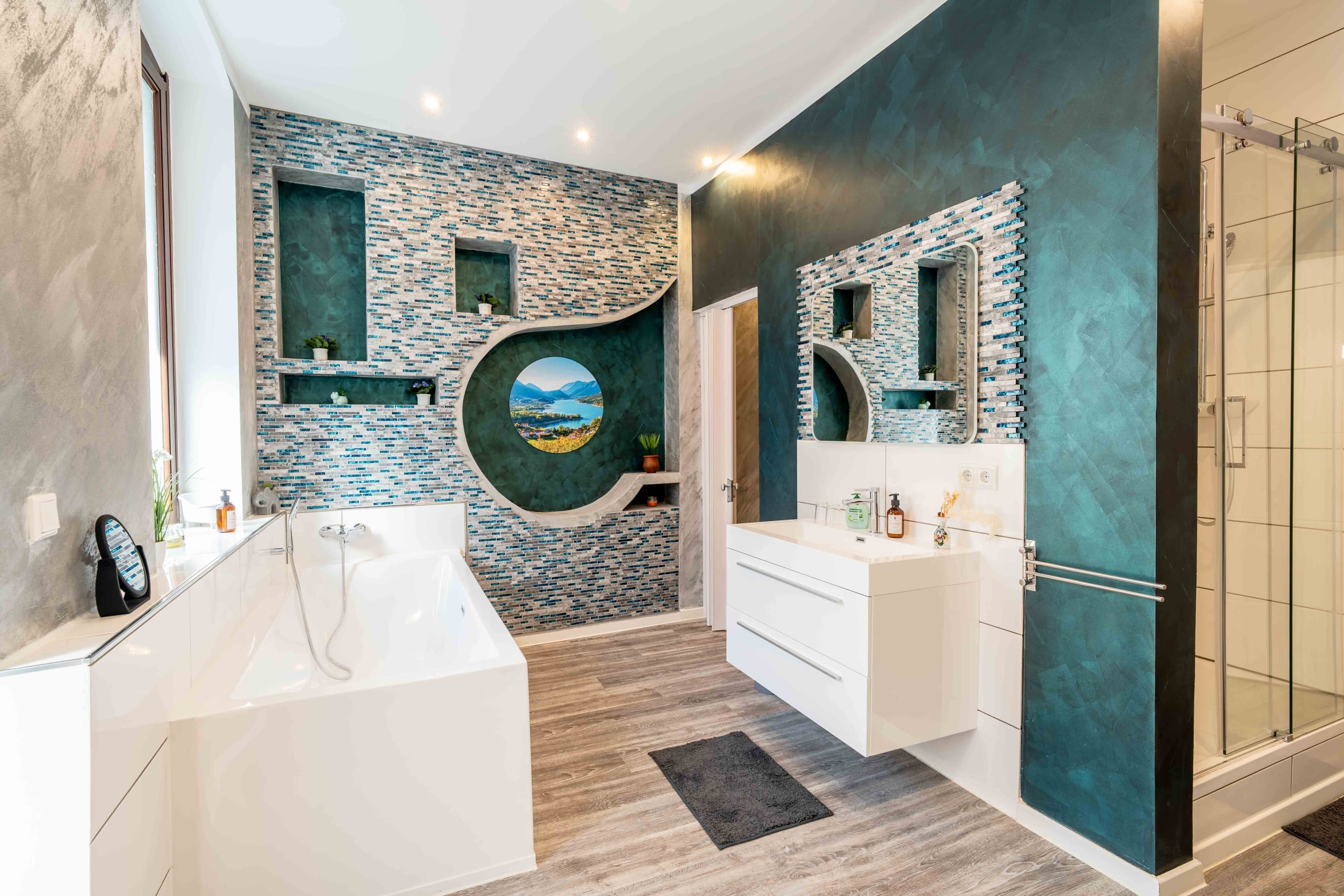 Un bagno moderno con vasca, mobile lavabo e doccia.