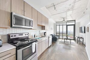 Fridge, microwave, oven, stovetop - Walkable Downtown Stay - Balcony, Pool & Gym (Charleston)
