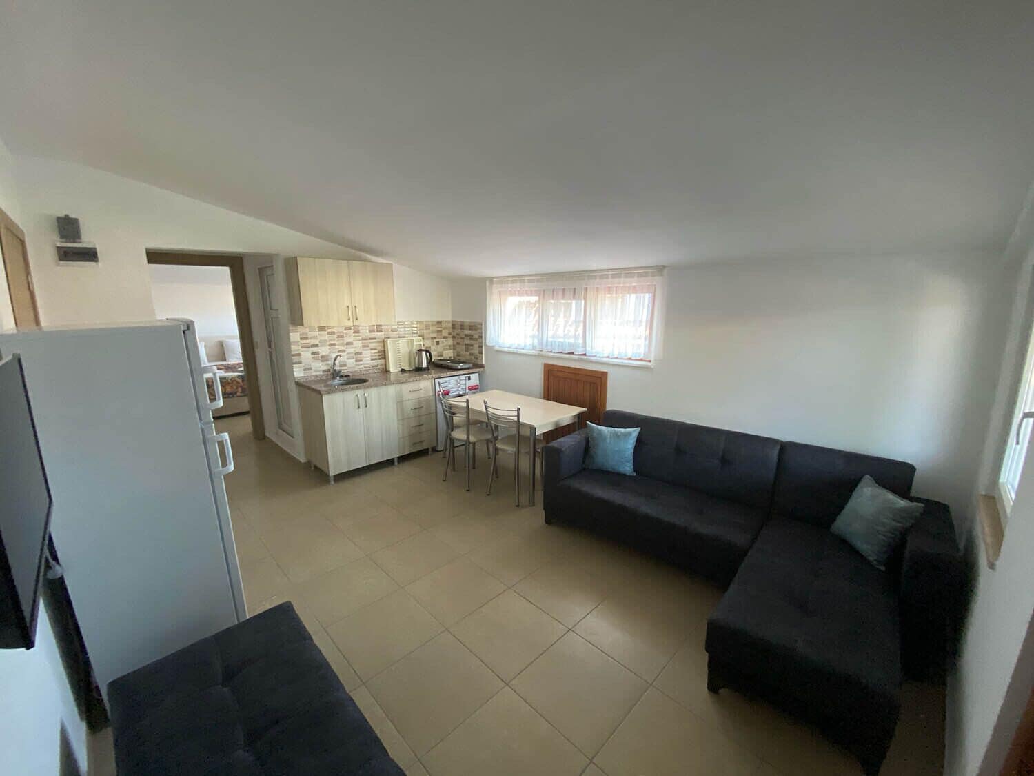 Basic-Apartment, 1 Doppelbett und Schlafsofa, Balkon | Wohnbereich
