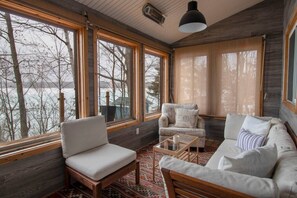 TV, fireplace, books - Little Lake Escape | Waterfront 2 Bedroom Getaway (Midland)