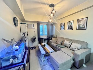 Living area - Manila Staycation for 4, near Taft, Skyway, Hospitals w/ pool & WiFi (Manila)