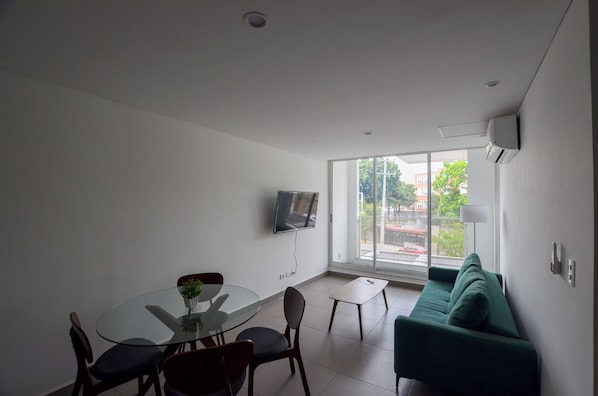 Suite, Balcony, City View | Living area - Paralelo Obispado (Monterrey)