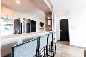 Exclusive Suite, Balcony, City View | Dining room