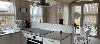 Holiday home with indoor spa near the sea