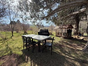 Outdoor dining - Secluded Off-Grid Yurt with Forest Access, Orchard & Gardens (Durango)