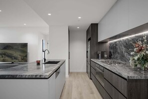 Private kitchen - Ocean Glimpse - A 3-Bedroom Designer Sub-Penthouse @ 333STK (Port Phillip)