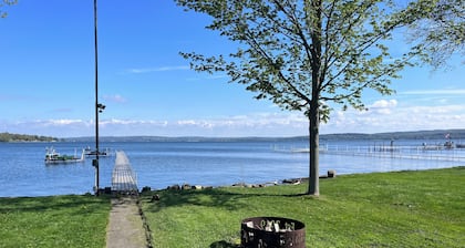 Unique Lakefront Property with dock slip and trampoline for the kids.