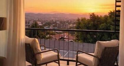 Luxury Apartment: Swimming pool, Gym, Cowork, Playroom, Panoramic view of the city.