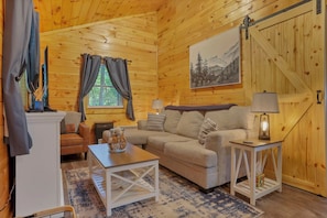 TV, fireplace - Romantic Hocking Hills Cabin Retreat with a Hot Tub (Logan)