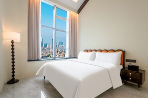 Standard Suite, City View | Desk, laptop workspace, blackout drapes, free WiFi - Mira Hotel Apartments  (Guangzhou)