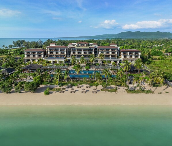 A resort with multiple buildings, a swimming pool, and a beach. - The Sira, a Luxury Collection Resort & Spa, Lombok (Tanjung)