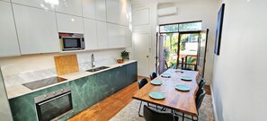 Fridge, microwave, oven, stovetop - Charming Terrace Retreat in the Heart of Surry Hills (Surry Hills)