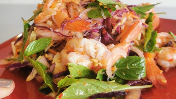 A plate of shrimp salad with greens and red cabbage. - Sovanphum Riverside Hotel (Phnom Penh)
