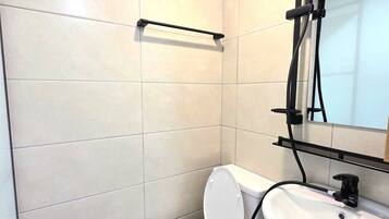 Shower, free toiletries, hair dryer, slippers