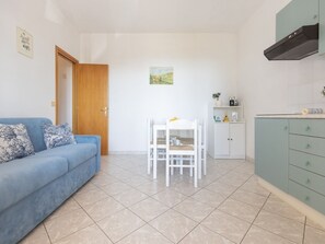 TV - One bedroom apartment with sea view terrace (Lacona)