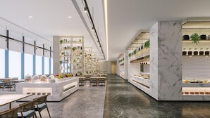 A modern hotel lobby with a marble reception desk, seating area, and a view of the sky through large windows. - Mauve Glamor Chengdu (Chengdu)