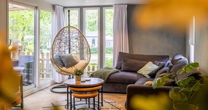 Charming chalet on a campsite with outdoor pool