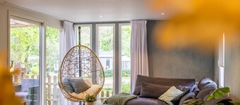 Charming chalet on a campsite with outdoor pool
