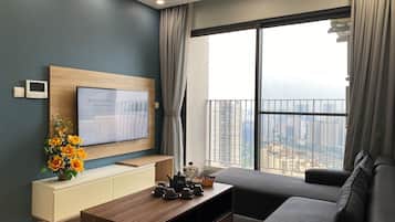 Deluxe Twin Room, City View | Living area