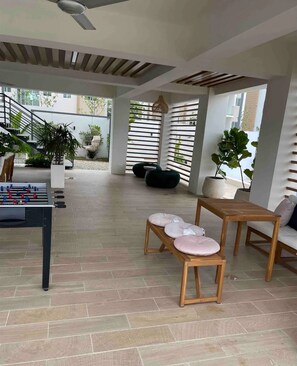 Outdoor dining - Alegría Boutique Apartment (Santiago de los Caballeros)