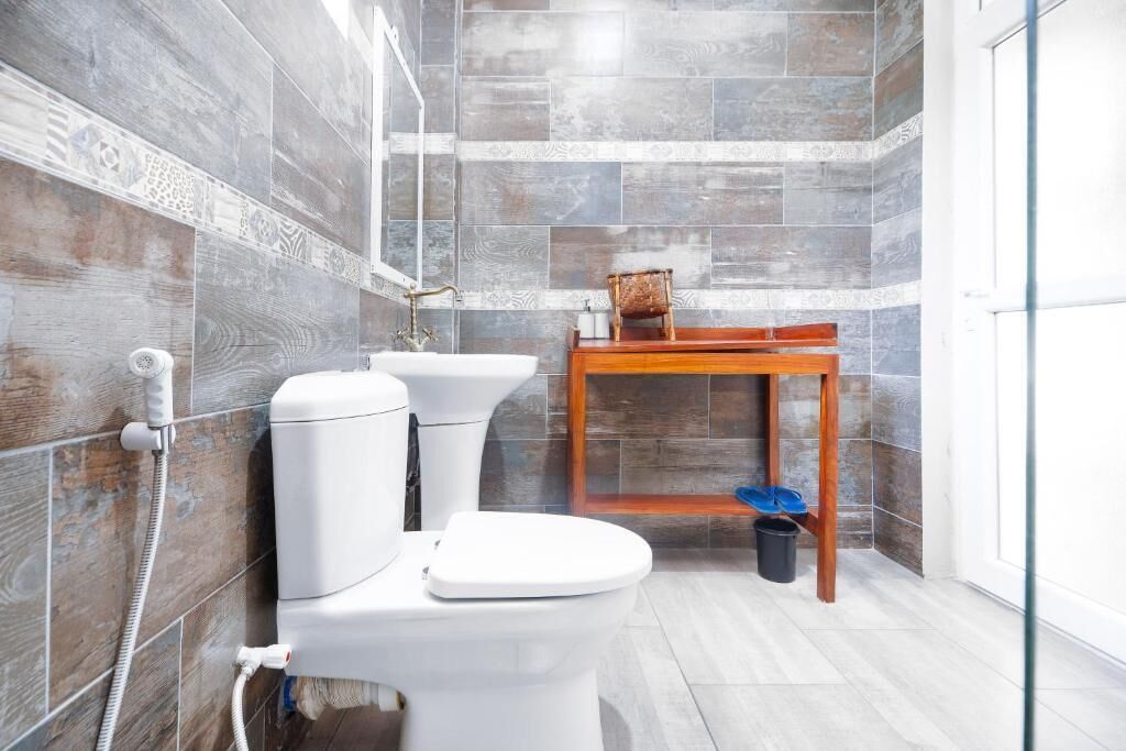 Habitación doble Deluxe, balcón, vista a la alberca | Baño