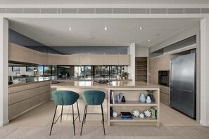 Fridge, microwave, oven, stovetop - Opulent Harbourside Sanctuary | 3 Bedrooms | 2.5 Bathrooms | Free Parking (Docklands)