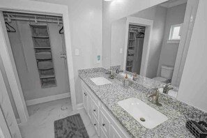 Bathroom - Stylish 2BR Uptown home with patio & parking. Near Superdome, streetcar, WWII Museum & French Quarter. (New Orleans)